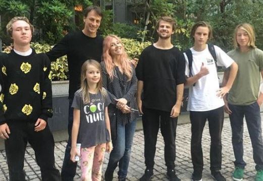 Keegan Hawk and his siblings with his father Tony Hawk and Catherine.